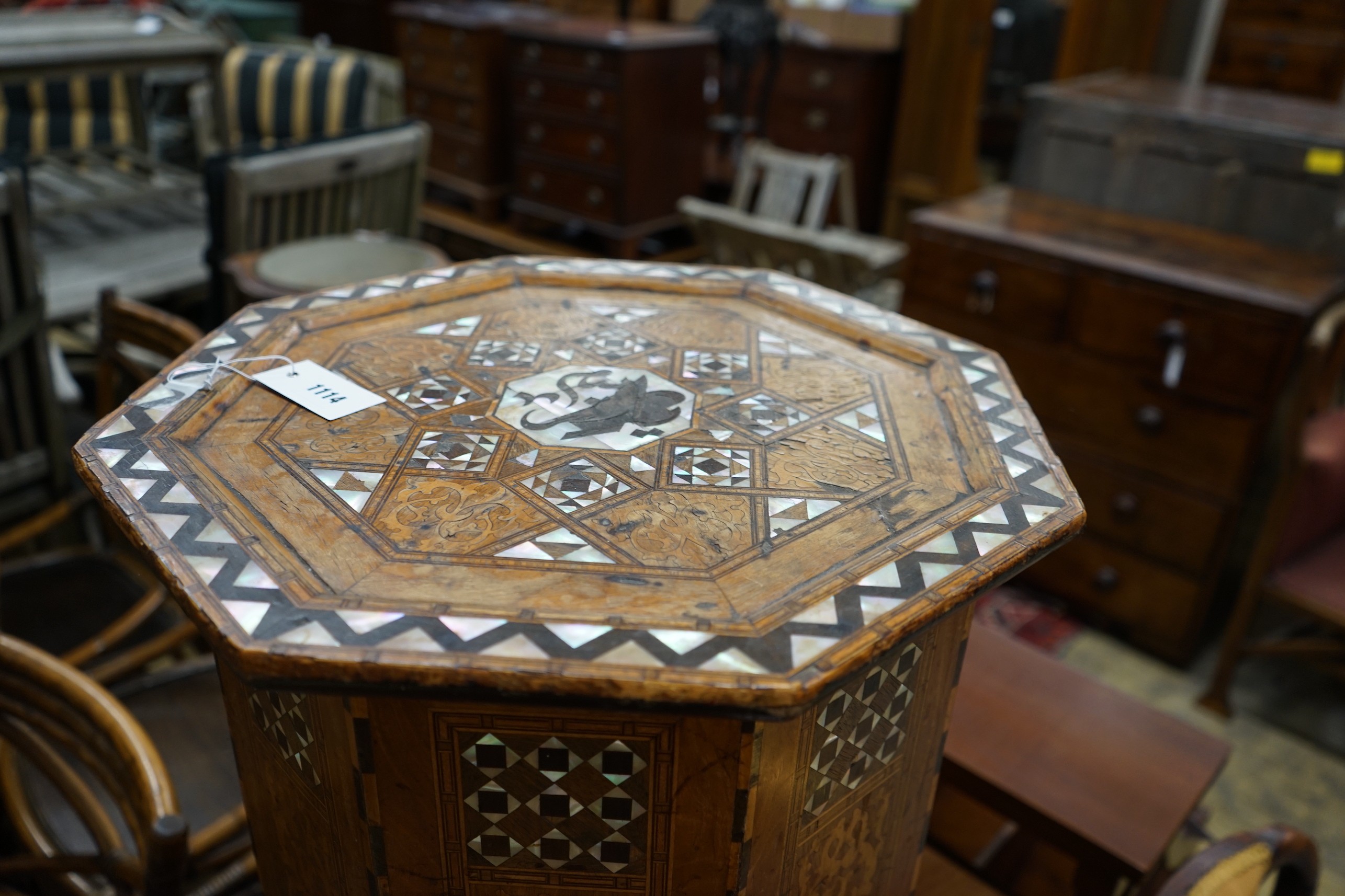 A Moorish octagonal mother of pearl inlaid centre table, width 46cm, height 62cm